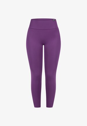 Lilla høj talje leggings lavet af glat, strækbart stof med en tætsiddende silhuet, der har et subtilt logo标签 ved livet.