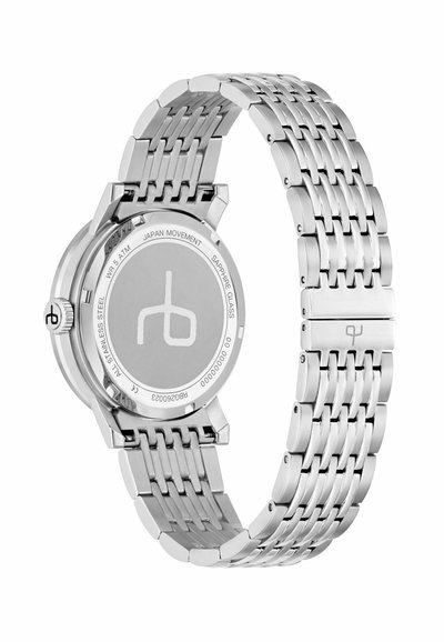 Montre-bracelet en acier inoxydable avec bracelet à maillons, dos gravé indiquant un mouvement japonais, verre saphir, résistance à l'eau, et logo de la marque sur la boucle et la couronne.