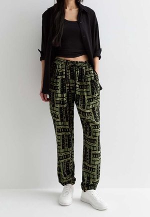 Pantalon de survêtement - mottled green