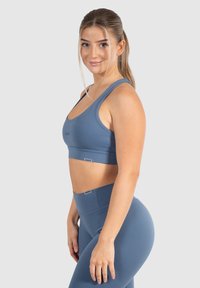 Smilodox SPORT BH ADVANCE PRO - Sujetadores deportivos con sujeción ligera - blau