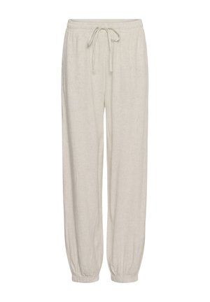 Pantalon beige à cordon de serrage avec taille et poignets élastiques, coupe ample, en tissu léger, adapté pour une tenue décontractée.