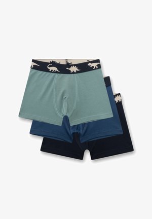 Drei Boxershorts für Jungen in Grün, Blau und Marine, jeweils mit einem dino-Muster am Bund.