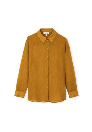 Mustard yellow long-sleeve shirt with a textured finish, a classic collar, and six front buttons. Features a curved hem and buttoned cuffs.