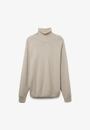 Beige turtleneck sweater med ribbet krave og manchetter, der har et blødt, tekstureret stof og en afslappet pasform. Enkel, ren design.