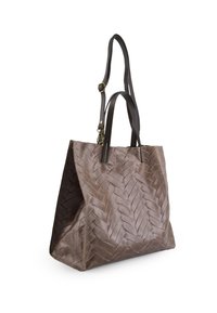 Brown woven texture tote bag with long brown straps and gold hardware accents. The surface features a herringbone pattern for added detail.