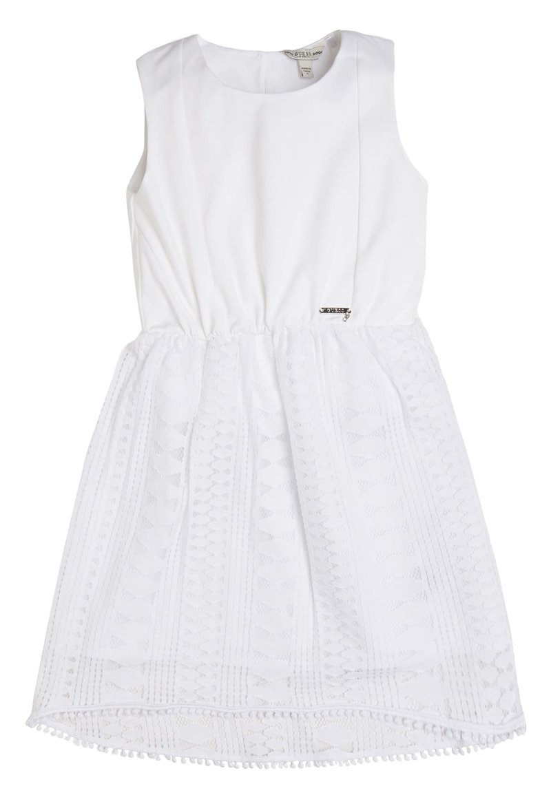 Robe blanche sans manches avec corsage uni et jupe texturée à motif, ornée de petits pompons sur l'ourlet, adaptée aux filles.