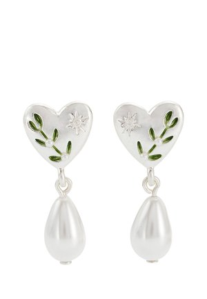 Silver heart-shaped earrings with green leaf and sun engravings, each featuring a white teardrop pearl dangling below.