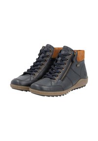 Bottines en cuir noir avec des accents en suède marron, lacets à l'avant, fermeture éclair sur le côté, surface texturée et semelle en caoutchouc avec motif antidérapant.