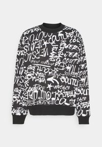 Černá mikina se vzorovaným bílým textem ve graffiti stylu a hvězdami. Disponuje klasickým kulatým výstřihem a žebrovanými manžetami. Vyrobena z měkkého materiálu.