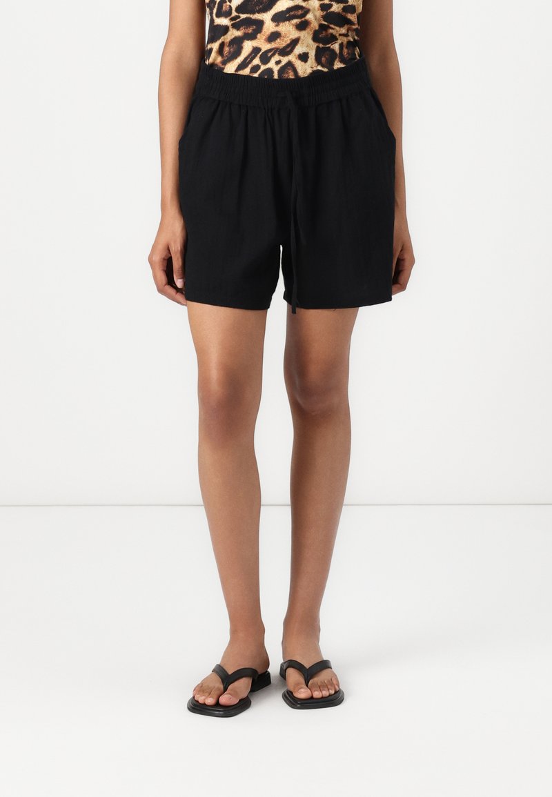 Black, linen blend shorts with an elastic waistband and side pockets, featuring a loose fit and casual style.