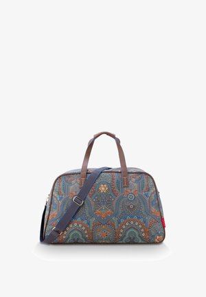 Travel duffel bag with brown handles, adjustable blue strap, and intricate blue, orange, and green paisley pattern.