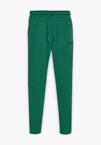 Grønne, elastiske sweatpants med snor i taljen, der har sidelommer og et lille broderet logo på venstre lår.