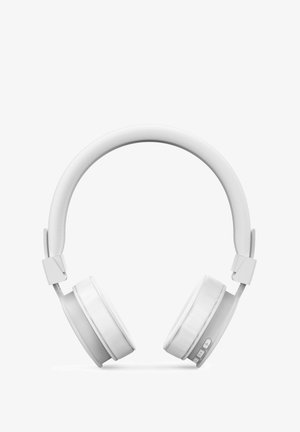 White over-ear headphones with a textured headband and circular ear cups. Features buttons on one ear cup for volume control.