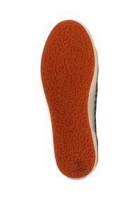 Semelle de chaussure avec une surface en caoutchouc orange texturé et un bord blanc, comportant un petit logo en relief.