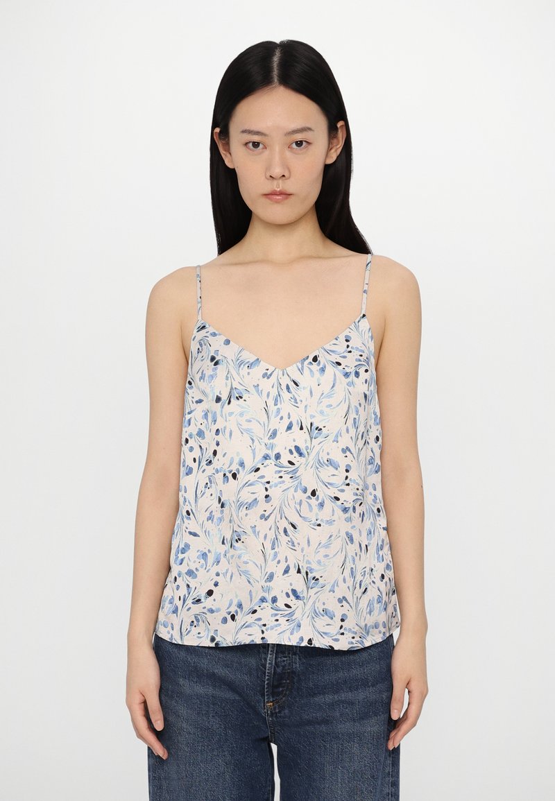 Lightweight, floral camisole with a V-neck, thin straps, and a cream background featuring blue and black leaf patterns.