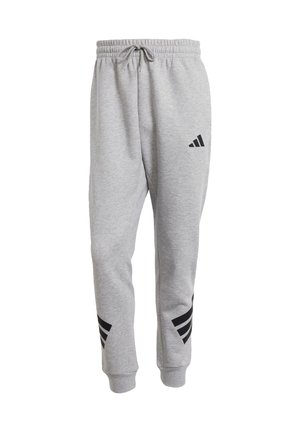 Grijze sweatpants met een elastische tailleband en aantrekkoord. Heeft zwarte gestreepte accenten op de onderbenen en een logodetail aan de zijkant.