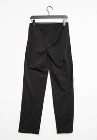 Puma Teplákové kalhoty - black