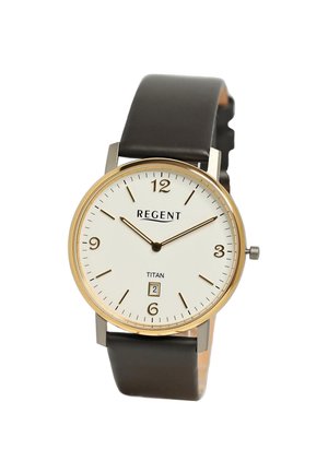 Montre classique avec cadran blanc, lunette en or, bracelet en cuir noir, affichant l'heure 10:10 et la date 2, étiquetée "REGENT" et "TITAN".