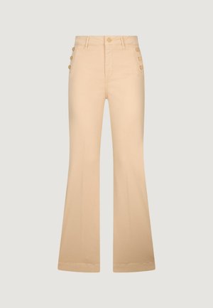 Pantalon beige taille haute avec jambes évasées, détails de boutons sur les hanches, passants de ceinture, et fermeture avant avec bouton et zip.
