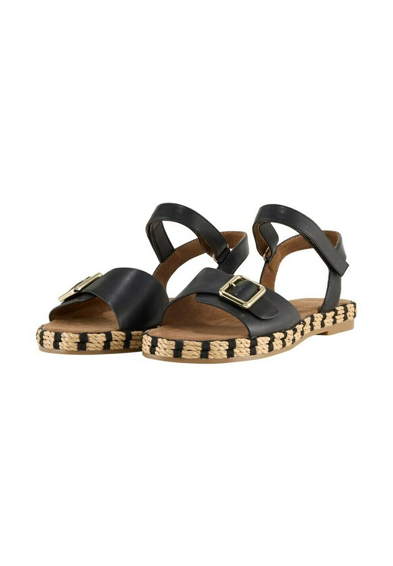 Black leather sandals with a wide strap and buckle detail, jute-wrapped sole with a black and natural woven pattern. Open back design.