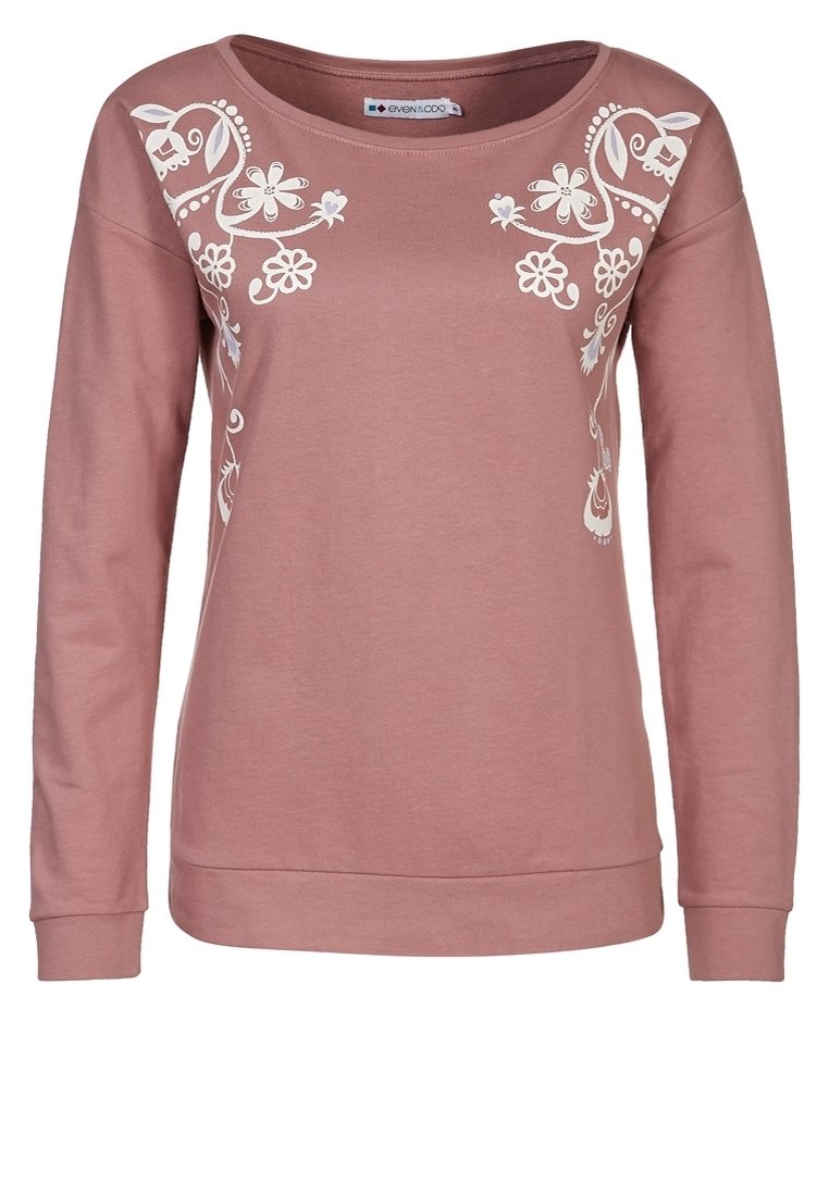 Felpa rosa a maniche lunghe realizzata in tessuto morbido. Presenta un ricamo floreale bianco sul davanti, scollo rotondo e polsini a costine.