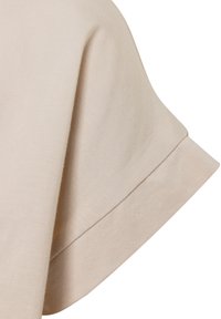 Beige Baumwoll-T-Shirt mit rundem Ausschnitt, kurzen Ärmeln und geripptem Muster. Verfügt über doppelt genähte Säume für Langlebigkeit.