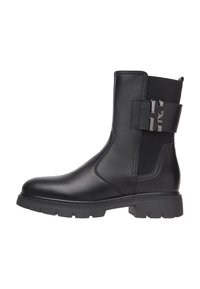 Black leather ankle boots with a chunky sole, elastic side panels, and a decorative strap with metal accents. Smooth texture throughout.