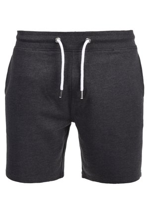 Szürke pamut sort, fehér zsinórral ellátott húzózsinórral, valamint két oldalsó zsebbel. Sima felület és térd feletti hosszúság.