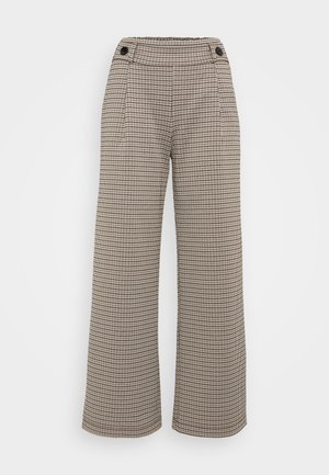 Wide-leg trousers in a black and white houndstooth pattern, featuring a high waistband and two buttons at the front with side pockets.