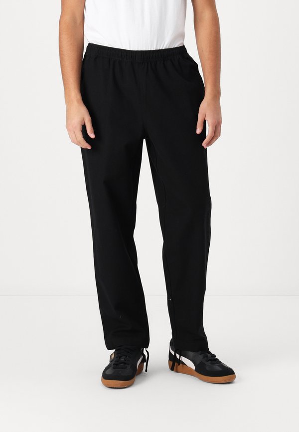 UNITE PANT UNISEX - Trousers