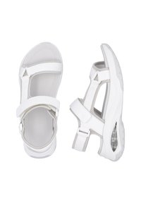 Sandales de sport blanches avec des sangles réglables, semelle intérieure texturée et semelle rembourrée. Présente un design robuste avec un bout arrondi.