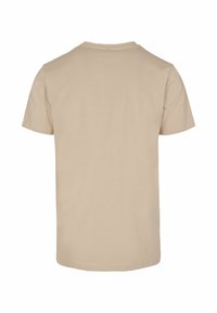 Beige bavlněné tričko s krátkými rukávy, kulatým výstřihem a hladkou texturou. Pohled zezadu ukazuje čistý, nezdobený design.