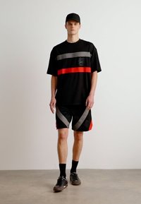 HUGO DISHORT - Träningsbyxor - black
