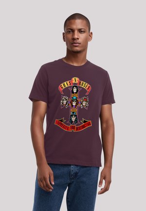 Maroon cotton t-shirt featuring a colorful graphic design of skulls and a cross with the text "Guns N' Roses Appetite for Destruction."