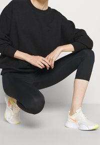 Sweaty Betty 3/4 sportovní kalhoty - black