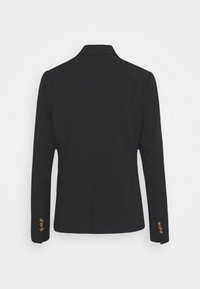 Blazer noir taillé sur mesure, vu de dos avec manches longues et trois boutons sur chaque manchette sur un fond blanc uni.