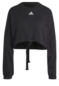 Svart kort sweatshirt i bomull med rund halsringning, långa ärmar och en knuten dragsko i nederkant. Adidas-logga i vitt.