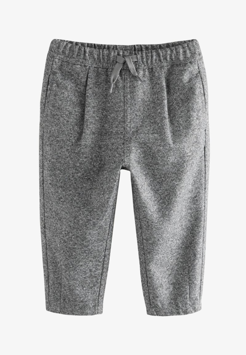 Szare dresowe spodnie dzianinowe z elastycznym pasem, troczkiem do związania, bocznymi kieszeniami i lekko zwężanymi nogawkami.