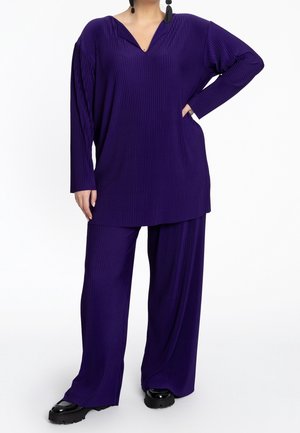 Spodnie materiałowe