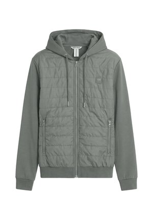 Chaqueta gris con capucha y cremallera, frontal acolchado, dos bolsillos laterales con cremallera, puños acanalados y logotipo AM en el pecho.