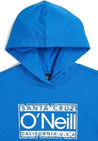 Modra jopa s kapuco iz teksturirane tkanine, z velikim belim grafičnim napisom, ki vključuje besedi "O'Neill" in "Santa Cruz".