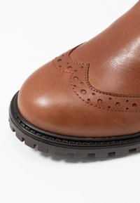 KIOMI Snowboots  - cognac