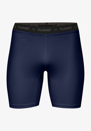 Marinblå sportshorts gjorda av stretchy material, med en svart midja med "hummel"-logotyp och slät textur.