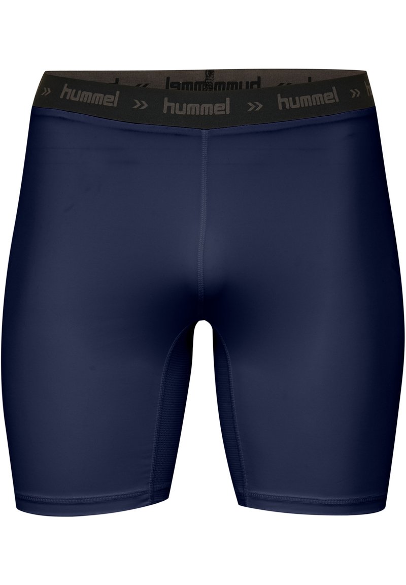 Marinblå sportshorts gjorda av stretchy material, med en svart midja med "hummel"-logotyp och slät textur.