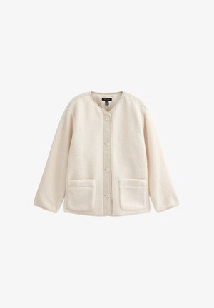 Giacca in micropile avorio con colletto tondo, chiusura frontale a bottoni, due tasche a toppa e maniche lunghe. Tessuto morbido con un design rilassato.