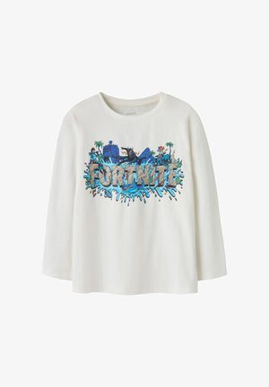 Maglietta bianca a maniche lunghe con stampa grafica colorata "FORTNITE", dettagli blu e illustrazioni di personaggi giocosi. Realizzata in morbido cotone.