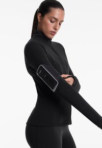 OYSHO LIGHT WARM TECHNICAL - Jakna za treniranje - black