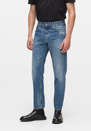 TAPERED - Siaurėjantys džinsai - distressed tinted dark blue