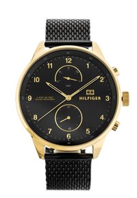 Montre analogique dorée avec cadran noir, marqueurs d'heure et sous-cadrans. Bracelet en maille noire. Affiche le jour et les détails de résistance à l'eau.
