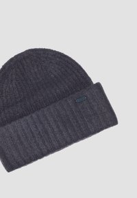 Dark gray knit beanie with a ribbed band and textured top, made from soft wool blend, featuring a small black logo tag on the side.